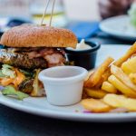 Head cap hamburgers with potatoes chips